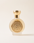 GOLDEN OUD by Taif Al Emarat, 75ml bottle with embossed gold medallion, on a plain cream background